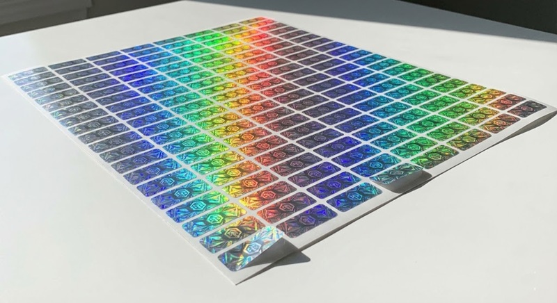 Xưởng sản xuất tem 7 màu hologram số lượng lớn Xưởng sản xuất tem 7 màu hologram số lượng lớn